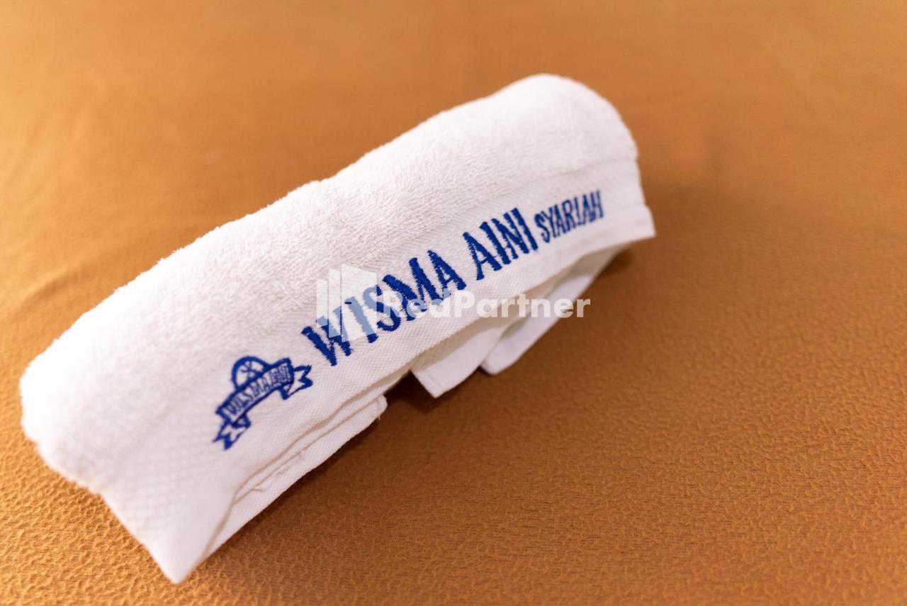 Wisma Aini Syariah Mitra Reddoorz 반다르 람풍 외부 사진