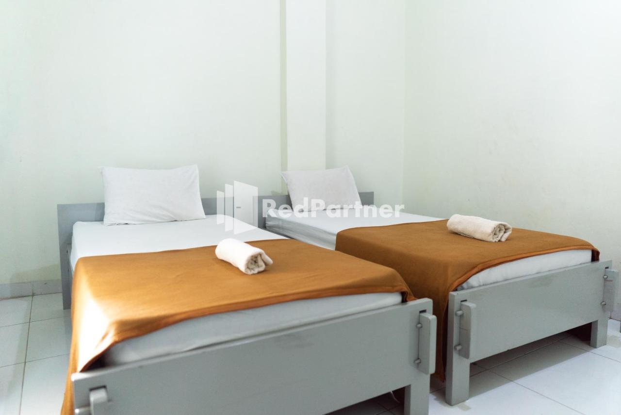 Wisma Aini Syariah Mitra Reddoorz 반다르 람풍 외부 사진
