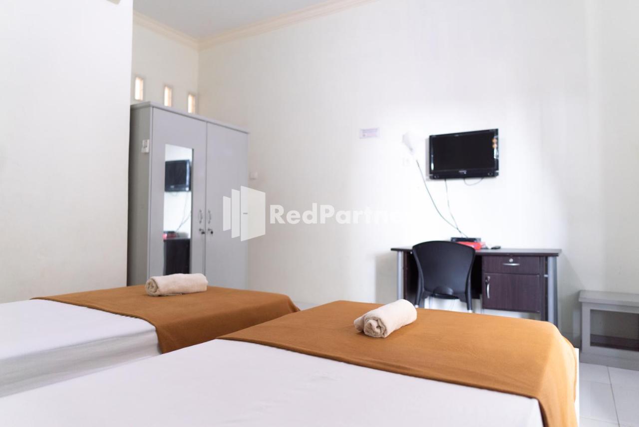 Wisma Aini Syariah Mitra Reddoorz 반다르 람풍 외부 사진