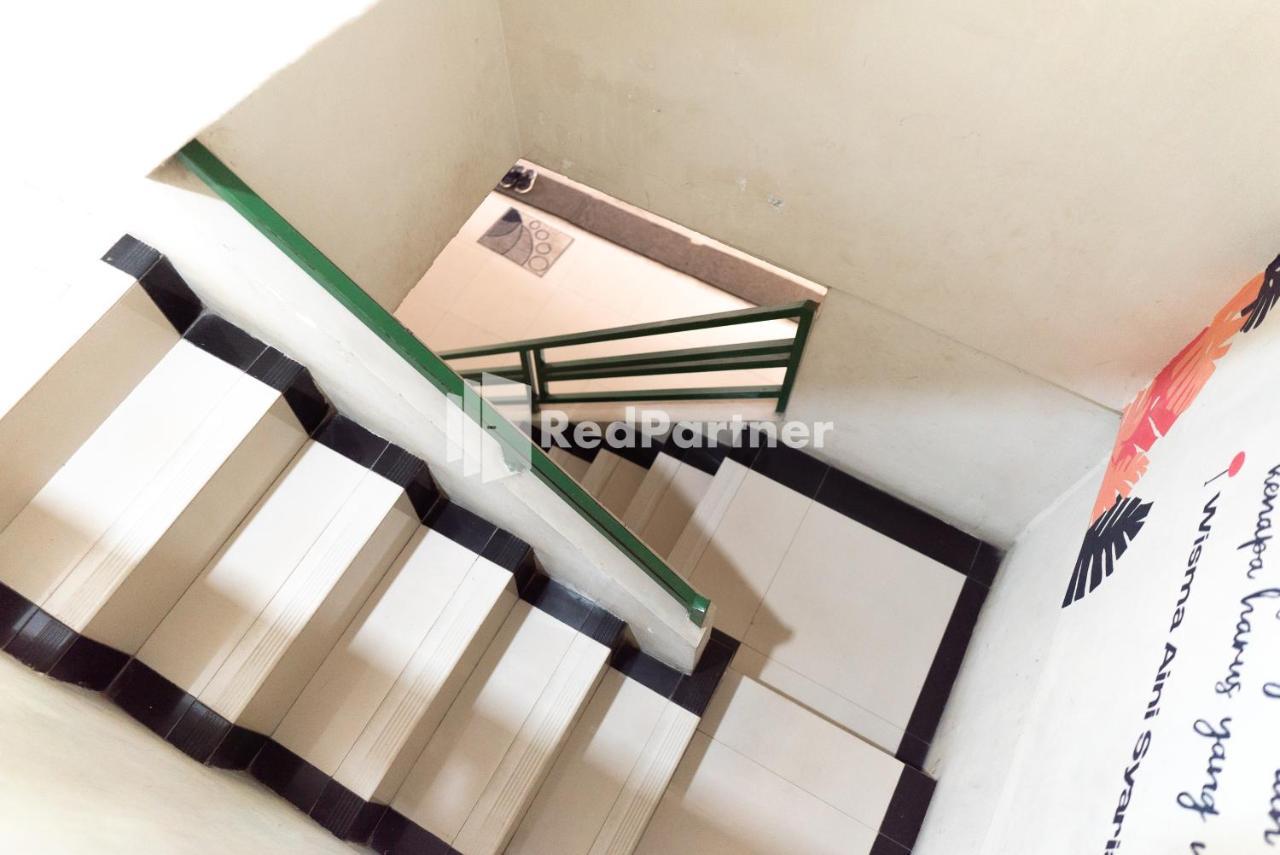 Wisma Aini Syariah Mitra Reddoorz 반다르 람풍 외부 사진