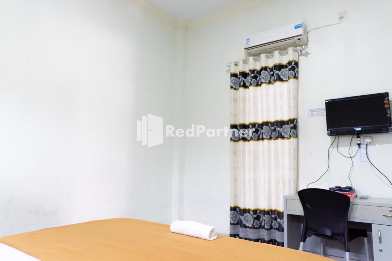 Wisma Aini Syariah Mitra Reddoorz 반다르 람풍 외부 사진